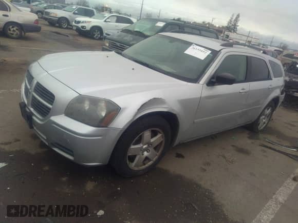 2005 Dodge Magnum SXT with VIN 2D8GZ48V65H538461, listed as a IAAI auction lot 36155852 with Not provided miles and . Bid and sale history available at DreamBid. Image 2.