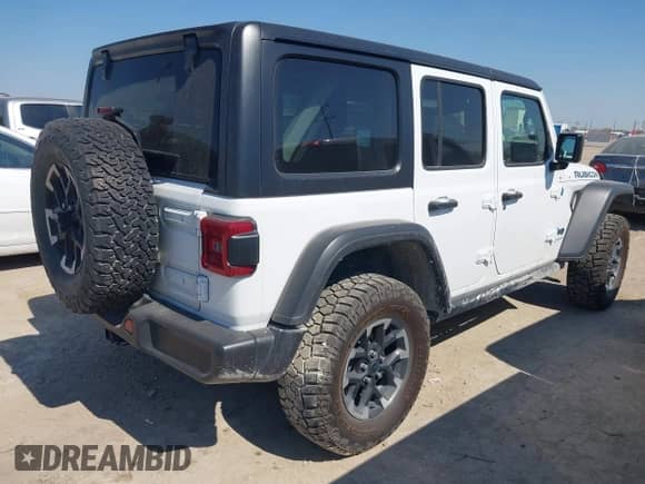2024 Jeep Wrangler Rubicon with VIN 1C4RJXR60RW223430, listed as a IAAI auction lot 43343638 with 53,374 mi miles and . Bid and sale history available at DreamBid. Image 4.