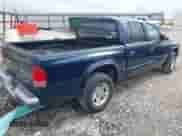 2003 Dodge Dakota Sport z VIN 1D7HL38X73S350060, wystawiony jako IAAI lot #42637905 z przebiegiem 189 251 mil mil oraz . Historia ofert i sprzedaży dostępna na DreamBid. Obrazek 4.