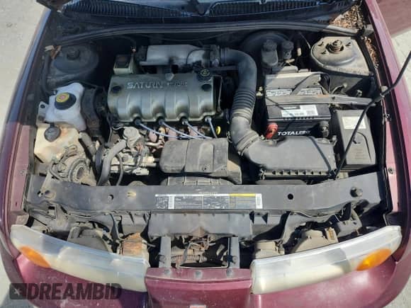 2002 Saturn SL with VIN 1G8ZG52882Z192053, listed as a Copart auction lot 68711695 with 309,633 mi miles and Salvage title. Bid and sale history available at DreamBid. Image 11.