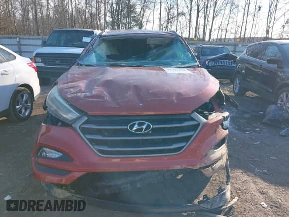 2016 Hyundai Tucson Sport z VIN KM8J33A23GU133430, wystawiony jako IAAI lot #41399258 z przebiegiem Nie podano mil oraz . Historia ofert i sprzedaży dostępna na DreamBid. Obrazek 11.