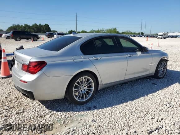 2013 BMW 7 Series 750i with VIN WBAYA8C54DC996698, listed as a Copart auction lot 53235915 with 116,247 mi miles and Salvage title. Bid and sale history available at DreamBid. Image 3.