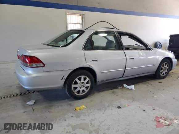 2002 Honda Accord SE with VIN 1HGCG66802A143764, listed as a Copart auction lot 82512395 with 174,800 mi miles and Salvage title. Bid and sale history available at DreamBid. Image 3.