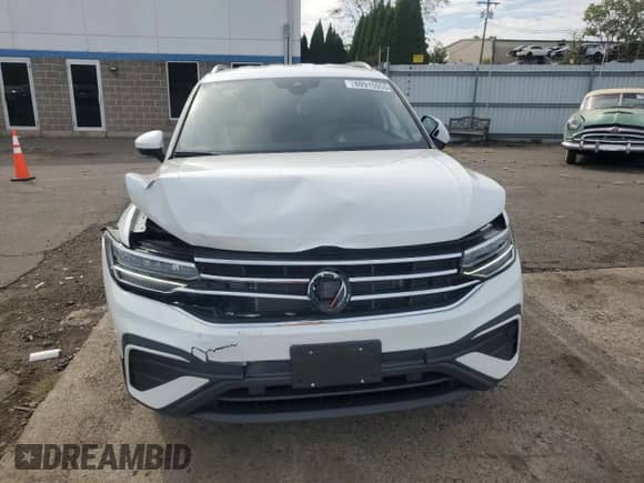 2024 Volkswagen Tiguan SE z VIN 3VV2B7AX1RM152968, wystawiony jako Copart lot #80915055 z przebiegiem 6 566 mil mil oraz Szkoda całkowita • Salvage title. Historia ofert i sprzedaży dostępna na DreamBid. Obrazek 5.