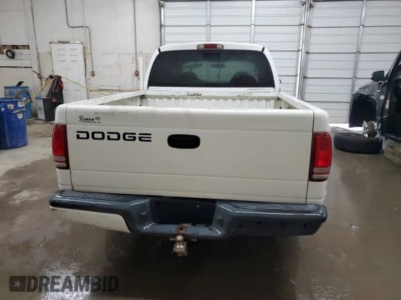 2002 Dodge Dakota Sport z VIN 1B7HL38XX2S650989, wystawiony jako Copart lot #73746534 z przebiegiem 392 280 mil mil oraz Szkoda całkowita • Salvage title. Historia ofert i sprzedaży dostępna na DreamBid. Obrazek 6.