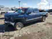 1999 Chevrolet Silverado 2500 LS with VIN 1GCGK29U5XZ171245, listed as a Copart auction lot 50006975 with 158,249 mi miles and Salvage title. Bid and sale history available at DreamBid. Image 1.