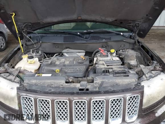 2014 Jeep Compass Latitude with VIN 1C4NJCEB5ED691041, listed as a IAAI auction lot 43112471 with 117,596 mi miles and . Bid and sale history available at DreamBid. Image 10.