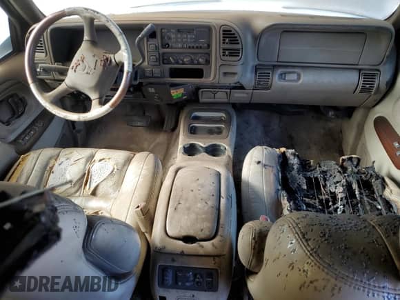 2000 Cadillac Escalade z VIN 1GYEK13R4YR103293, wystawiony jako Copart lot #58673244 z przebiegiem Nie podano mil oraz Nie do naprawy • Non repairable. Historia ofert i sprzedaży dostępna na DreamBid. Obrazek 8.