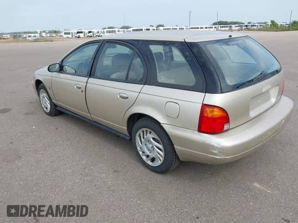 1998 Saturn SW with VIN 1G8ZK8273WZ212450, listed as a IAAI auction lot 43189008 with 146,351 mi miles and . Bid and sale history available at DreamBid. Image 3.