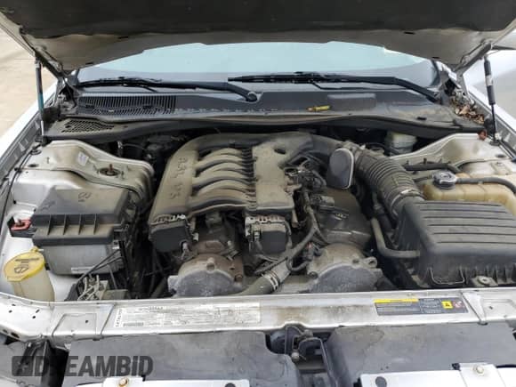 2005 Chrysler 300 Touring с VIN 2C3AA53GX5H613239, выставлен на аукционе Copart как лот 66903215 с пробегом 263 686 миль миль и Списание • Salvage title. История ставок и продаж доступна на DreamBid. Изображение 11.