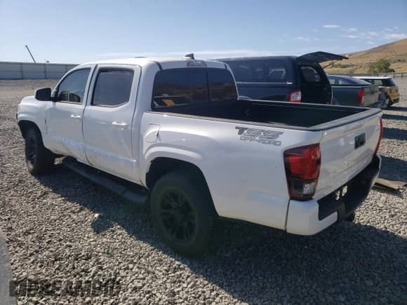 2021 Toyota Tacoma SR z VIN 5TFCZ5AN7MX267045, wystawiony jako Copart lot #65592105 z przebiegiem 40 992 mil mil oraz Szkoda całkowita • Salvage title. Historia ofert i sprzedaży dostępna na DreamBid. Obrazek 2.