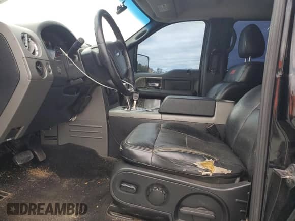 2006 Ford F-150 XLT with VIN 1FTPW14V36FA88511, listed as a Copart auction lot 69152395 with 216,622 mi miles and Salvage title. Bid and sale history available at DreamBid. Image 7.