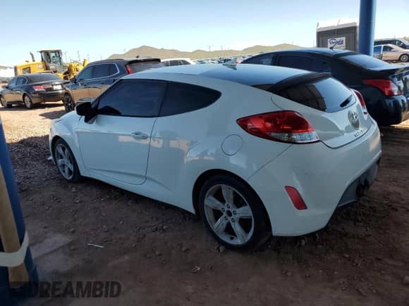 2013 Hyundai Veloster w/Black Int z VIN KMHTC6AD5DU147868, wystawiony jako Copart lot #81929665 z przebiegiem 139 774 mil mil oraz Czysty tytuł • Clean title. Historia ofert i sprzedaży dostępna na DreamBid. Obrazek 2.