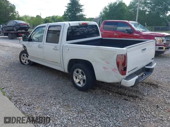 2010 Chevrolet Colorado 1LT z VIN 1GCDSCDE8A8136835, wystawiony jako IAAI lot #42139723 z przebiegiem 102 529 mil mil oraz . Historia ofert i sprzedaży dostępna na DreamBid. Obrazek 3.