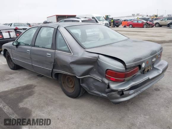 1991 Chevrolet Caprice z VIN 1G1BL53E8MW151443, wystawiony jako IAAI lot #41556364 z przebiegiem 136 440 mil mil oraz . Historia ofert i sprzedaży dostępna na DreamBid. Obrazek 3.