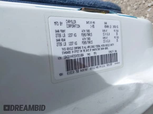 1995 Dodge Grand Caravan with VIN 1B4GK44R3SX591084, listed as a IAAI auction lot 42852583 with 78,412 mi miles and . Bid and sale history available at DreamBid. Image 9.