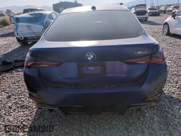 2023 BMW i4 M50 with VIN WBY33AW06PFN71595, listed as a Copart auction lot 61422005 with 34,241 mi miles and Salvage title. Bid and sale history available at DreamBid. Image 6.