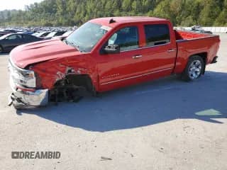 2018 Chevrolet Silverado 1500 LTZ с VIN 3GCUKSEC7JG239018, выставлен на аукционе Copart как лот 81246655 с пробегом 63 197 миль миль и Списание • Salvage title. История ставок и продаж доступна на DreamBid. Изображение 1.