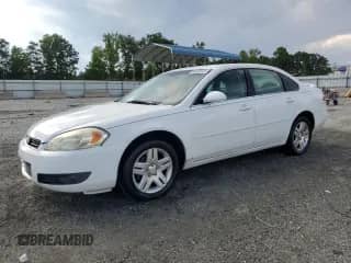 2006 Chevrolet Impala LT 3.9L with VIN 2G1WC581369259763, listed as a Copart auction lot 66530805 with 128,557 mi miles and Salvage title. Bid and sale history available at DreamBid. Image 1.