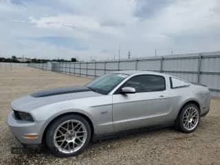 2010 Ford Mustang GT с VIN 1ZVBP8CH2A5123708, выставлен на аукционе Copart как лот 67608105 с пробегом 79 692 миль миль и Списание • Salvage title. История ставок и продаж доступна на DreamBid. Изображение 1.