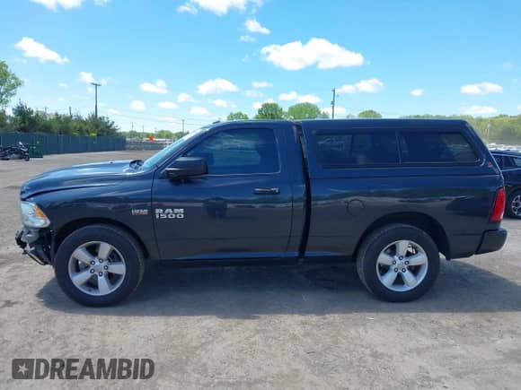 2014 Ram 1500 Express z VIN 3C6JR7AT9EG255106, wystawiony jako IAAI lot #42319230 z przebiegiem 96 662 mil mil oraz . Historia ofert i sprzedaży dostępna na DreamBid. Obrazek 15.