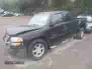 2002 GMC Sierra 1500 Denali z VIN 2GTFK69UX21339224, wystawiony jako IAAI lot #43264760 z przebiegiem 240 363 mil mil oraz . Historia ofert i sprzedaży dostępna na DreamBid. Obrazek 2.