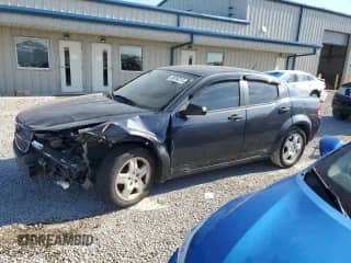2008 Dodge Avenger SE with VIN 1B3LC46K08N216905, listed as a Copart auction lot 69793215 with 239,703 mi miles and Salvage title. Bid and sale history available at DreamBid. Image 1.