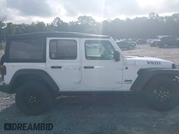 2021 Jeep Wrangler Unlimited Willys with VIN 1C4HJXDM8MW577187, listed as a IAAI auction lot 42731864 with 71,256 mi miles and . Bid and sale history available at DreamBid. Image 14.