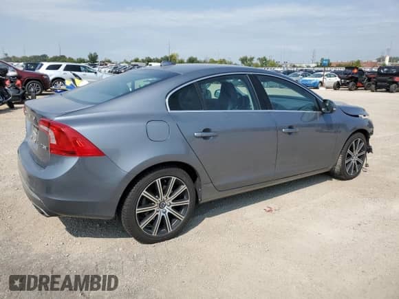 2017 Volvo S60 Inscription Platinum с VIN LYV402TM1HB151651, выставлен на аукционе Copart как лот 80094125 с пробегом 122 457 миль миль и Списание • Salvage title. История ставок и продаж доступна на DreamBid. Изображение 3.