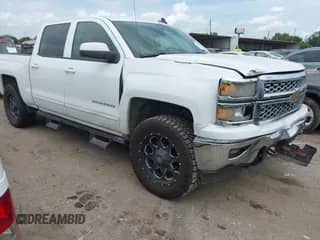 2015 Chevrolet Silverado 1500 LT with VIN 3GCUKREC0FG323956, listed as a IAAI auction lot 42623914 with 173,131 mi miles and . Bid and sale history available at DreamBid. Image 1.