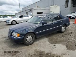1996 Mercedes-Benz C с VIN WDBHA22E1TF449580, выставлен на аукционе Copart как лот 57122045 с пробегом 98 180 миль миль и Чистый • Clean title. История ставок и продаж доступна на DreamBid. Изображение 1.
