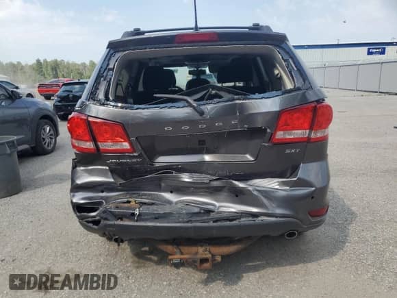 2015 Dodge Journey SXT с VIN 3C4PDCCG6FT530112, выставлен на аукционе Copart как лот 67988845 с пробегом 302 628 миль миль и Списание • Salvage title. История ставок и продаж доступна на DreamBid. Изображение 6.