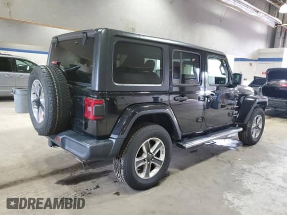 2021 Jeep Wrangler Unlimited Sahara High Altitude with VIN 1C4HJXEG9MW571844, listed as a Copart auction lot 81482334 with 77,409 mi miles and Salvage title. Bid and sale history available at DreamBid. Image 3.