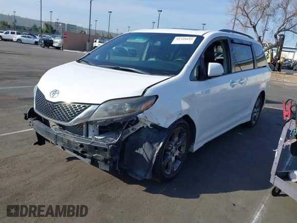 2015 Toyota Sienna SE with VIN 5TDXK3DC6FS627578, listed as a IAAI auction lot 41568684 with 124,138 mi miles and . Bid and sale history available at DreamBid. Image 2.