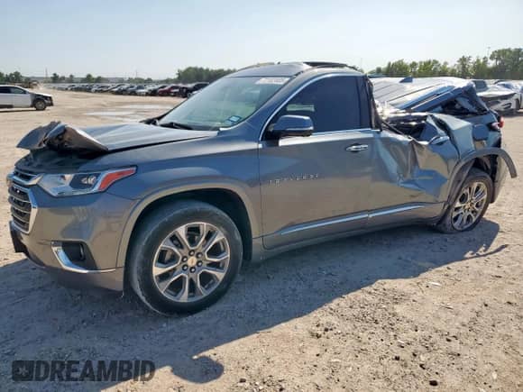 2020 Chevrolet Traverse Premier with VIN 1GNERKKW0LJ236243, listed as a Copart auction lot 72102405 with 130,858 mi miles and Salvage title. Bid and sale history available at DreamBid. Image 1.