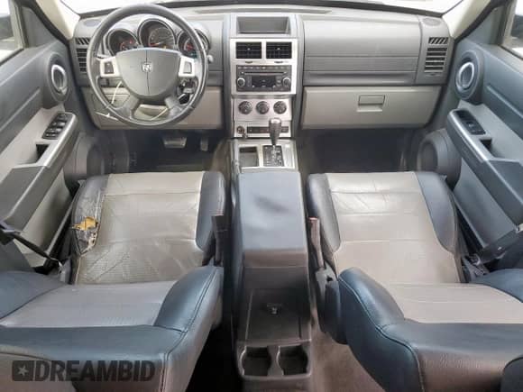 2007 Dodge Nitro SLT с VIN 1D8GT58K17W736432, выставлен на аукционе Copart как лот 84244375 с пробегом 203 027 миль миль и Списание • Salvage title. История ставок и продаж доступна на DreamBid. Изображение 8.