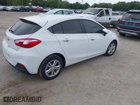 2018 Chevrolet Cruze LT with VIN 3G1BE6SM8JS527686, listed as a IAAI auction lot 43103541 with 64,399 mi miles and . Bid and sale history available at DreamBid. Image 4.