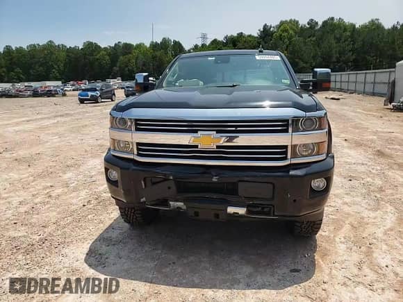 2015 Chevrolet Silverado 2500HD High Country с VIN 1GC1KXEG1FF620567, выставлен на аукционе Copart как лот 59094405 с пробегом 75 143 миль миль и Списание • Salvage title. История ставок и продаж доступна на DreamBid. Изображение 14.
