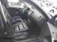 2009 Volkswagen Tiguan SE with VIN WVGBV75N39W542769, listed as a IAAI auction lot 43459249 with 117,821 mi miles and . Bid and sale history available at DreamBid. Image 5.