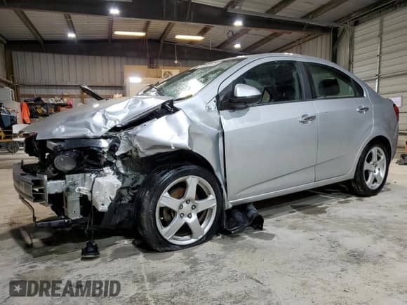 2013 Chevrolet Sonic LTZ with VIN 1G1JE5SH6D4102528, listed as a Copart auction lot 47419475 with 129,812 mi miles and Salvage title. Bid and sale history available at DreamBid. Image 1.