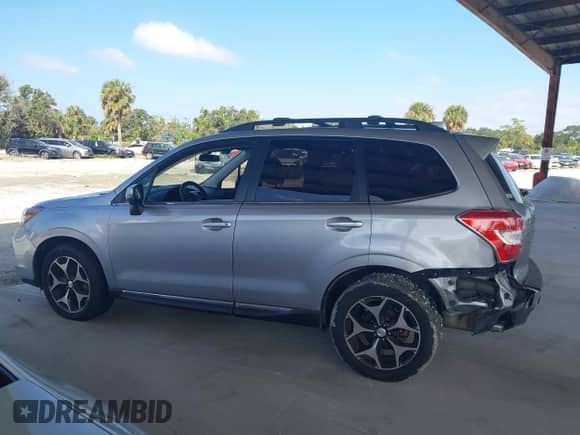 2016 Subaru Forester XT Touring with VIN JF2SJGXC1GH405232, listed as a IAAI auction lot 43370477 with 201,225 mi miles and . Bid and sale history available at DreamBid. Image 14.