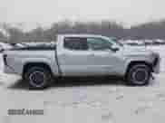 2024 Toyota Tacoma SR5 with VIN 3TMLB5JN6RM018639, listed as a IAAI auction lot 41251861 with 10,088 mi miles and . Bid and sale history available at DreamBid. Image 13.