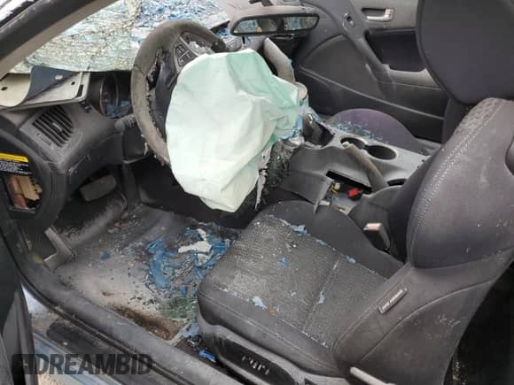 2012 Hyundai Genesis Coupe 2.0T z VIN KMHHT6KD3CU066273, wystawiony jako Copart lot #35418506 z przebiegiem Nie podano mil oraz Nie do naprawy • Non repairable. Historia ofert i sprzedaży dostępna na DreamBid. Obrazek 9.