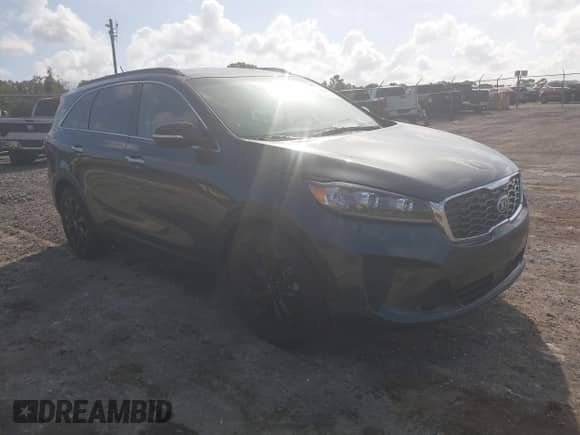 2020 Kia Sorento LX z VIN 5XYPG4A52LG692773, wystawiony jako IAAI lot #40548112 z przebiegiem 37 344 mil mil oraz . Historia ofert i sprzedaży dostępna na DreamBid. Obrazek 1.