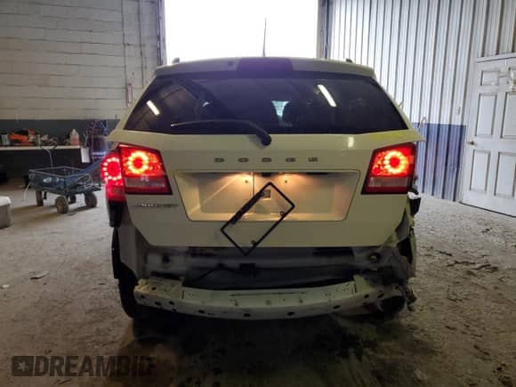2019 Dodge Journey SE with VIN 3C4PDCBB4KT862890, listed as a Copart auction lot 80110295 with 297,173 mi miles and Salvage title. Bid and sale history available at DreamBid. Image 6.