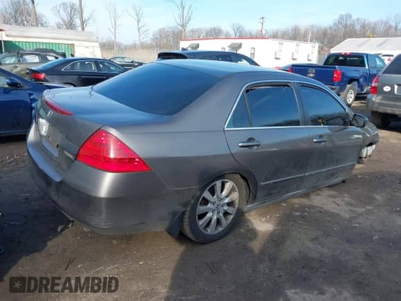 2007 Honda Accord LX with VIN 1HGCM66357A025441, listed as a IAAI auction lot 41199111 with 304,723 mi miles and . Bid and sale history available at DreamBid. Image 4.