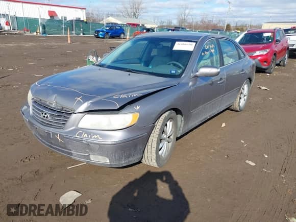 2008 Hyundai Azera Limited z VIN KMHFC46F18A303830, wystawiony jako IAAI lot #41488930 z przebiegiem 245 844 mil mil oraz . Historia ofert i sprzedaży dostępna na DreamBid. Obrazek 17.