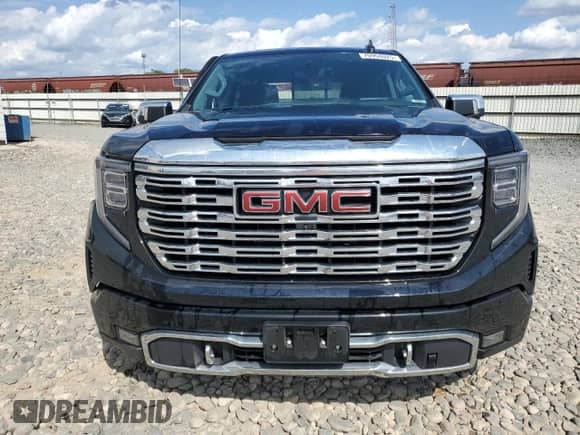 2023 GMC Sierra 1500 Denali с VIN 3GTUUGE85PG143996, выставлен на аукционе Copart как лот 70958025 с пробегом 57 331 миль миль и Списание • Salvage title. История ставок и продаж доступна на DreamBid. Изображение 5.