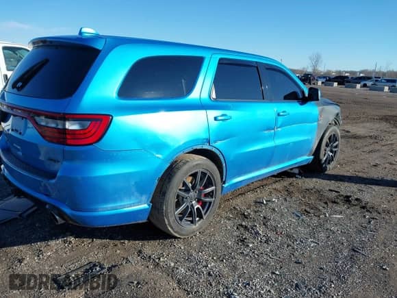 2018 Dodge Durango SRT with VIN 1C4SDJGJ1JC415720, listed as a IAAI auction lot 41193674 with 63,140 mi miles and . Bid and sale history available at DreamBid. Image 4.