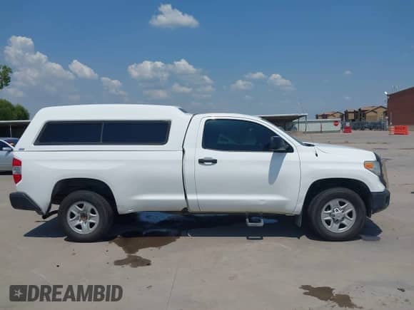 2014 Toyota Tundra with VIN 5TFNU5F16EX032487, listed as a IAAI auction lot 42988213 with 473,889 mi miles and . Bid and sale history available at DreamBid. Image 13.